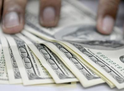 Philippine peso breaches 52 vs dollar, first time in 2.5 years